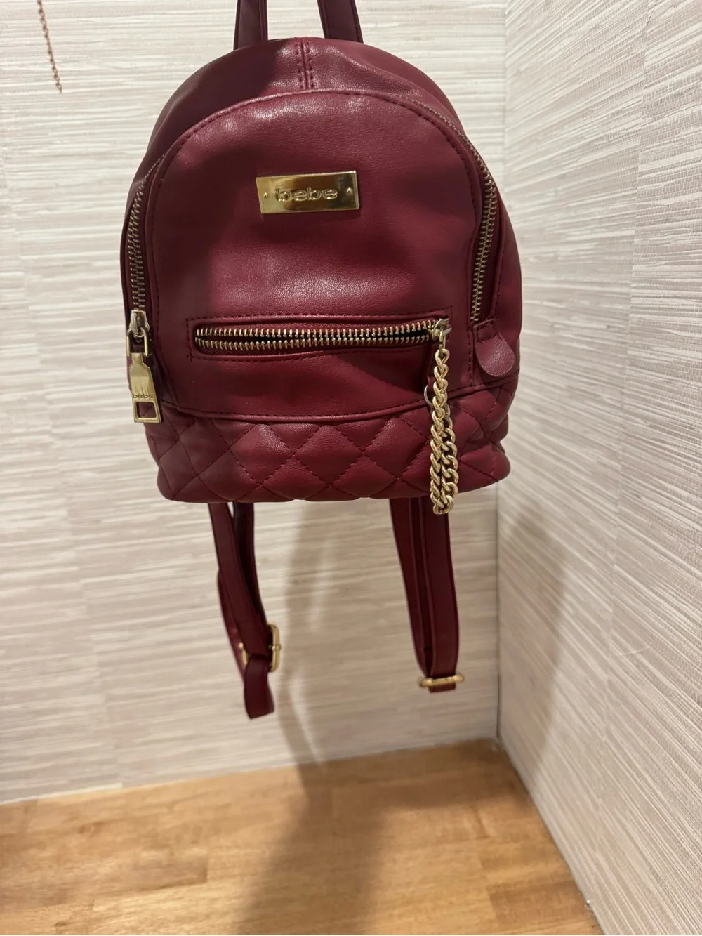 bebe Small Quilted Backpack in Burgundy with Gold Chain